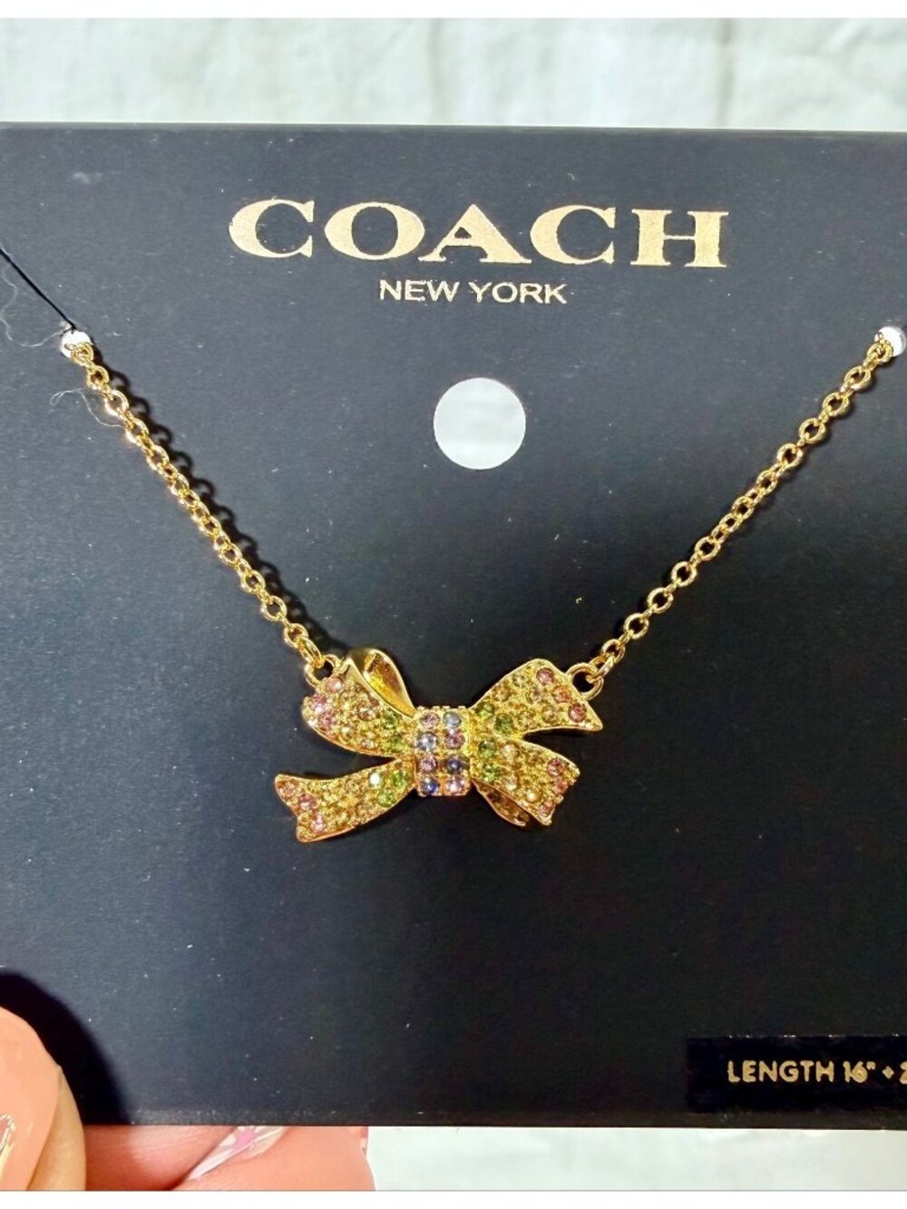 Coach bow necklace